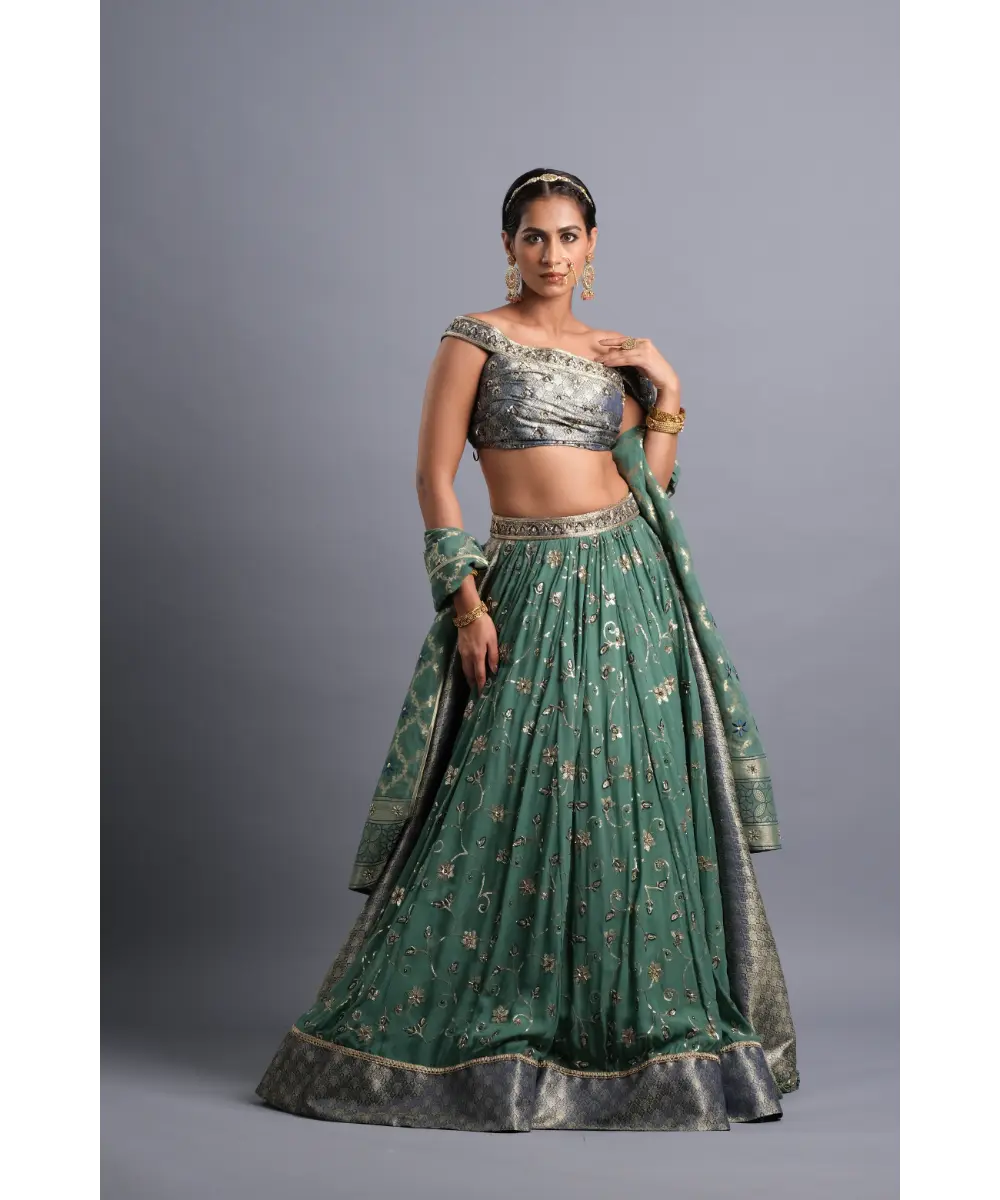 AASTHA SOOD - Teal green georgette Zardozi Lehenga